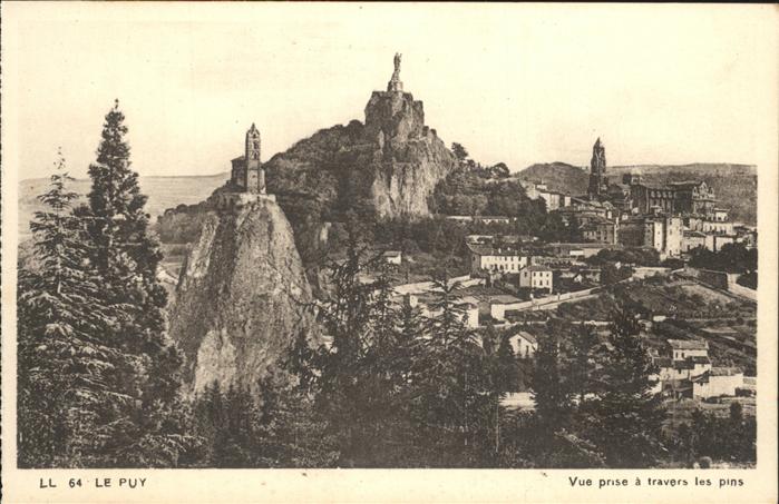 Le Puy de Dome Vue prise a travers les pins eglise mon
