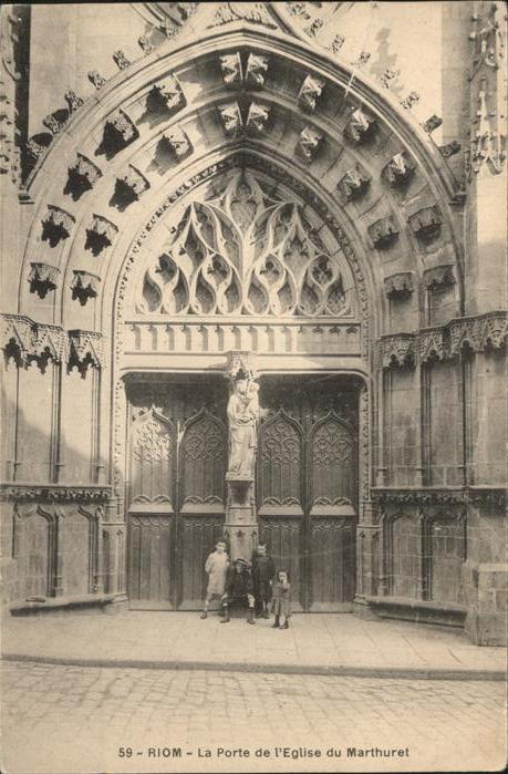 Riom Puy-de-Dome Porte de l'Eglise du Marthuret sculptur