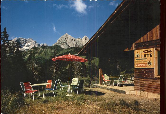 Mauthen Enzianhuette Mauthneralm Jausenstation mit Kellerwand Mooskofel