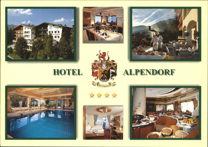 St Johann Tirol Hotel Alpendorf Terrasse Hallenbad Wappen