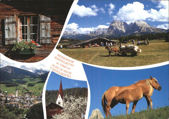Kastelruth Suedtirol Seiser Alm Fenster eines Bauernhofes Kirche Langkofel Platt