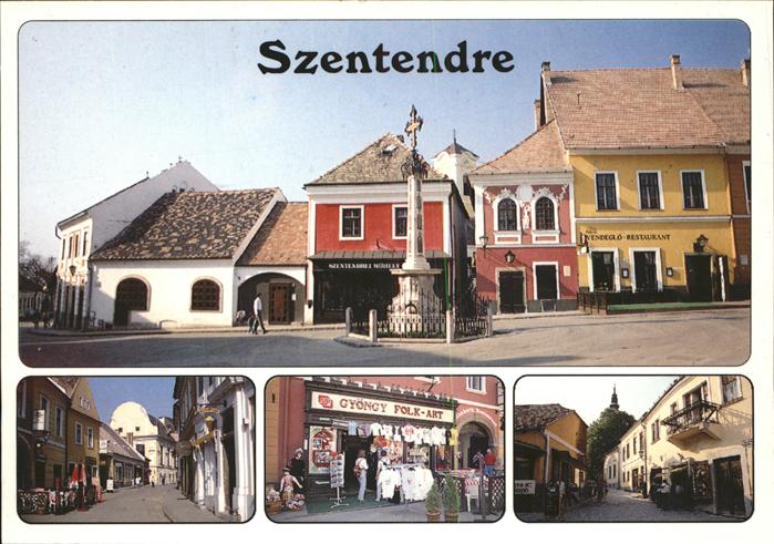 Szentendre Teilansichten Kreuz Pestsaeule Restaurant Strassenpartie