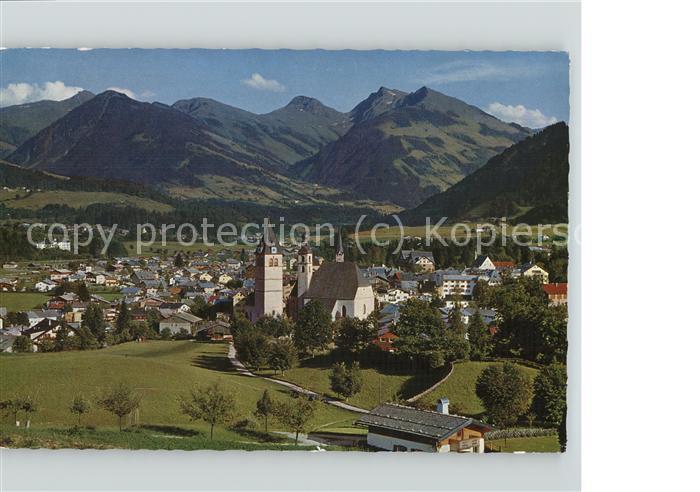 Kitzbuehel Tirol Ortsansicht mit Kirche Alpenpanorama