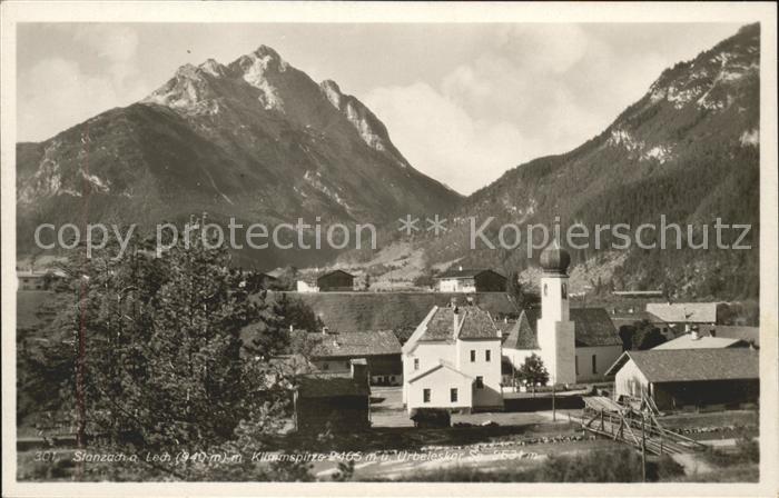 Stanzach Tirol Ortsansicht mit Kirche Klimmspitze Urbeleskarspitze Allgaeuer Alp