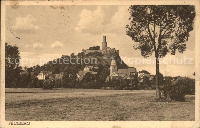 Felsberg Hessen Ortsansicht mit Kirche und Felsburg mit Butterfassturm
