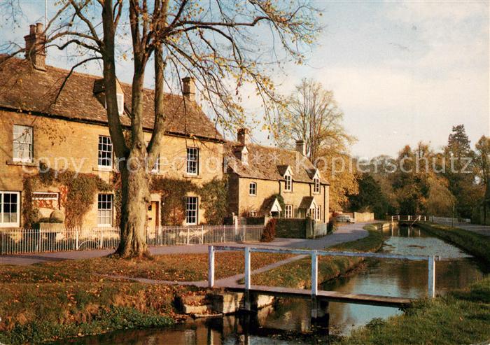 Gloucester Stream flows slowly throug the village under old stone bridges