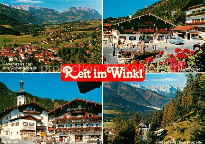 Reit Winkl Panorama mit Kaisergebirge Dorfbrunnen Rathaus Kriegergedaechtniskape