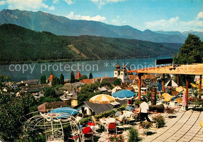 Millstatt Millstaettersee Sonnenterrasse Blick ueber den See Alpenpanorama