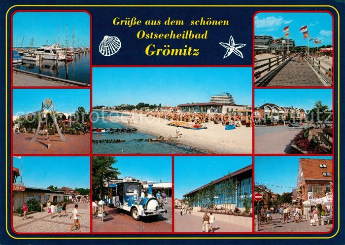 Groemitz Ostseebad Hafen Seebruecke Strand Touristenbahn Strassenpartie