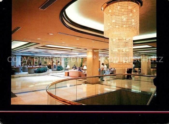 Kowloon Grand Tower Hotel The chandelier and the sun lit lobby