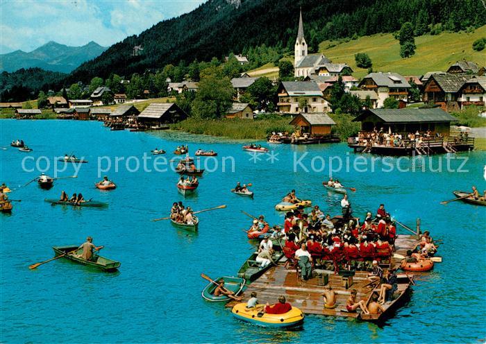 Weissensee Kaernten Flosskonzert der Trachtenkapelle