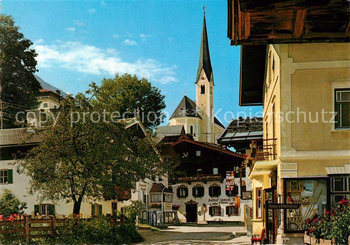 Kirchberg Tirol Ortspartie mit Kirche