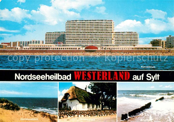 Westerland Sylt Kurzentrum Ansicht vom Meer aus Duenen Strand Reetdachhaus Brand