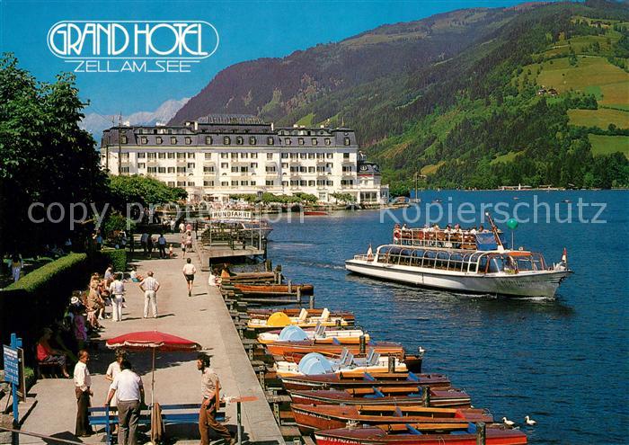 Zell See Seepromenade mit Grand Hotel und Schiffsanlegeplaetzen