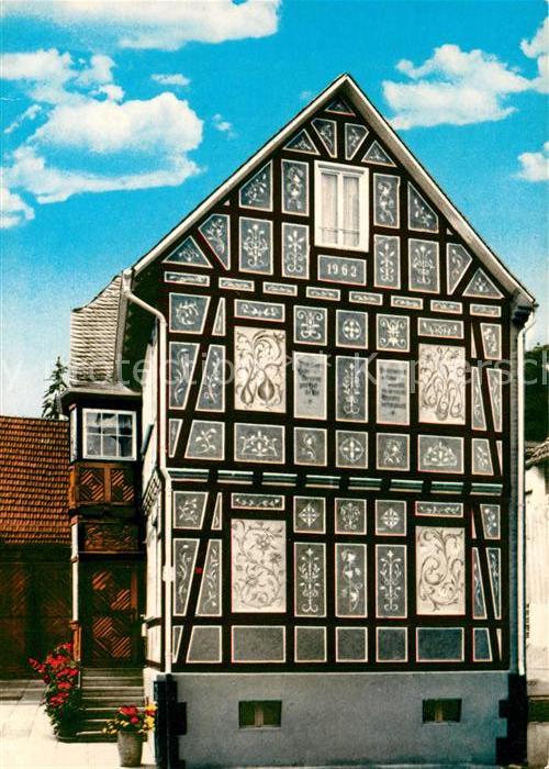 Holzhausen Huenstein Kratzputzhaus