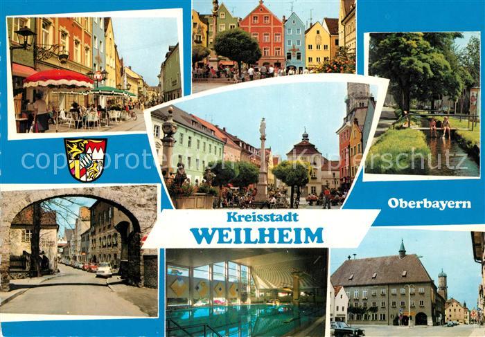 Weilheim Oberbayern Strassencafes Innenstadt Saeule Marktplatz Hallenbad