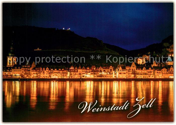 Zell Mosel Blick ueber die Mosel zur Weinstadt Nachtaufnahme
