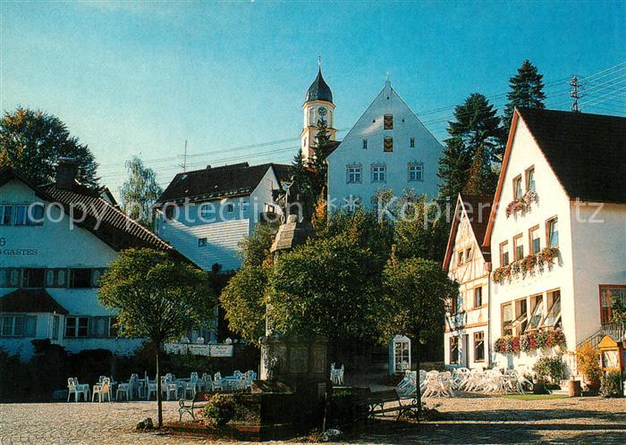 Bad Groenenbach Marktplatz Brunnen Strassencafe Blick zur Kirche