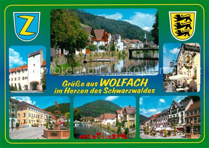 Wolfach Hauptstrasse Partie an der Kinzig Strassencafes Brunnen Apotheke Wappen
