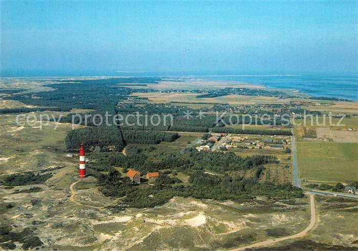Insel Amrum Fliegeraufnahme mit Leuchtturm Sueddorf und Nebel