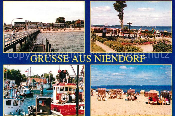 Niendorf Ostseebad Seebruecke Strand Promenade Hafen Fischkutter