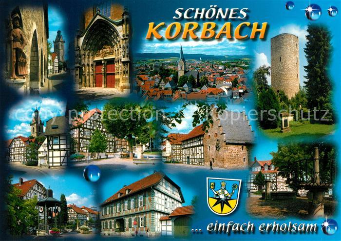 Korbach Statue Kirchenportal Stadtblick Turm Fachwerkhaeuser