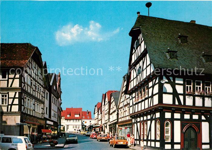 Schotten Hessen Marktstrasse am alten Rathaus Fachwerkhaeuser Luftkurort Naturpa