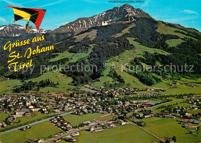 St Johann Tirol mit Kitzbueheler Horn Drachenflieger Fliegeraufnahme