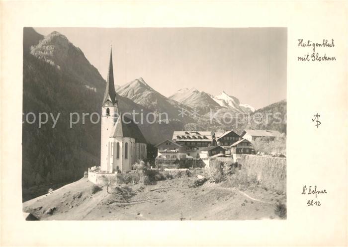 Heiligenblut Kaernten Ortsansicht mit Kirche Blick zum Grossglockner Hohe Tauern
