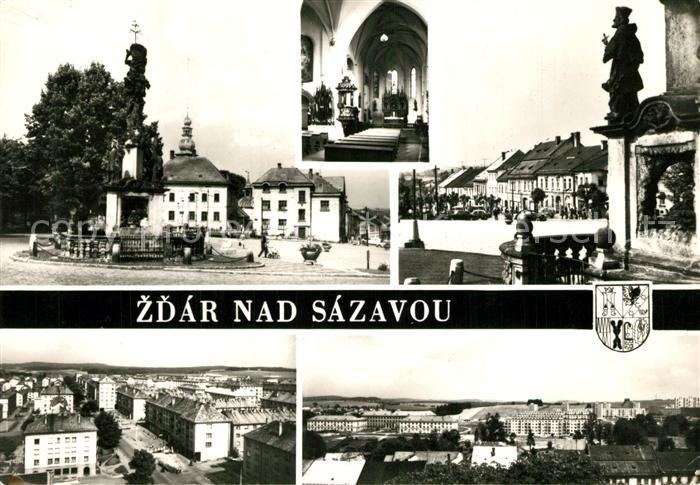 Zdar nad Sazavou Saar Saeule Rathaus Kirche Platz Statue Stadtpanorama Schule