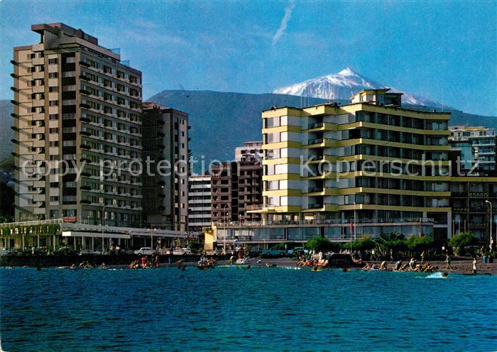 Puerto de la Cruz Playa y Hoteles al fondo pico del Teide Apartamentos Martinay