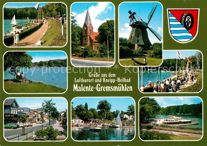 Malente-Gremsmuehlen Promenade Kirche Windmuehle Strand Bootsanlegestelle
