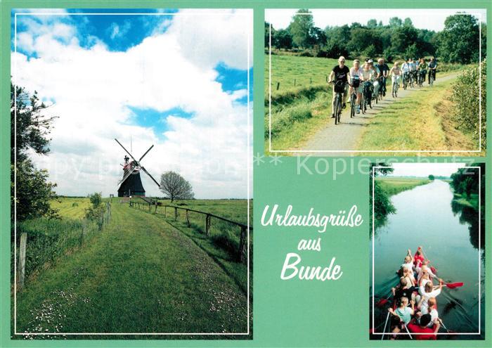 Bunde Ostfriesland Windmuehle Radfahrgruppe Bootspartie