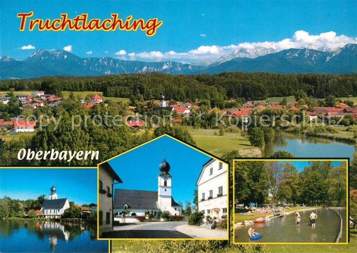 Truchtlaching Gesamtansicht mit Alpenpanorama Freibad Ortsmotiv mit Kirche See