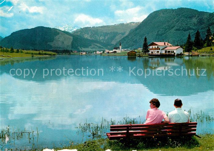 St Ulrich Pillersee Uferpartie Ruhebank am See nahe Strandbad Blattl Alpenblick