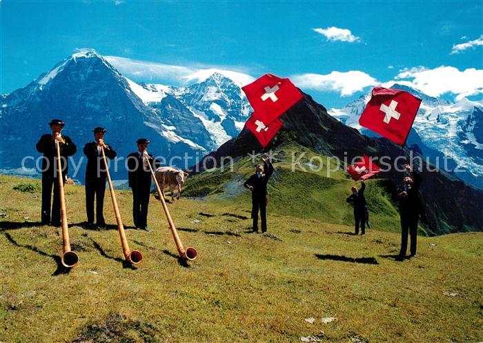 Alphorn Alphornblaeser Fahnenschwinger Eiger Moench Jungfrau