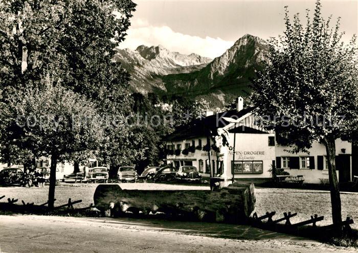 Fischen Allgaeu Anger mit Dorfbrunnen