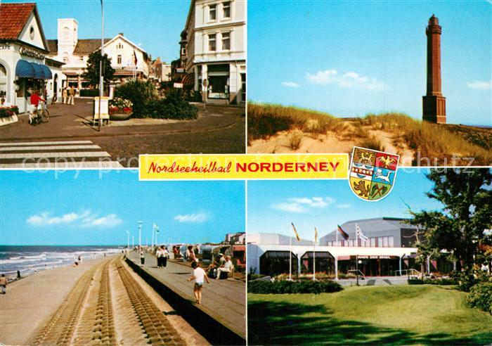 Norderney Nordseebad Ortsmotiv Leuchtturm Duenen Strand Promenade Haus der Insel