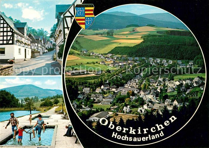 Oberkirchen Sauerland Fachwerkhaeuser Freibad Wassertreten Blick ins Tal Fernsic