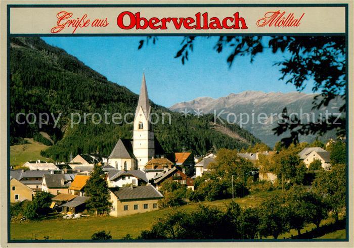Obervellach Kaernten Ortsansicht mit Kirche Blick gegen die Hohen Tauern