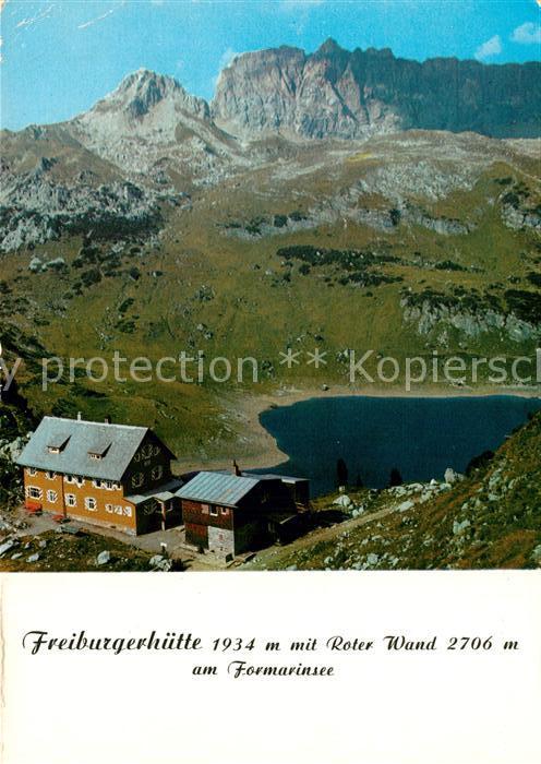 Freiburgerhuette Berghaus mit Roter Wand am Formarinsee Lechquellengebirge