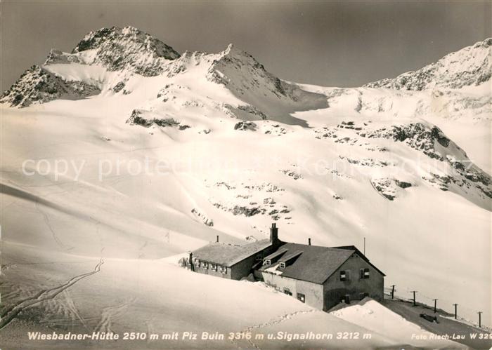 Galtuer Tirol Wiesbadner Huette mit Piz Buin und Signalhorn Berghuette Winterspo