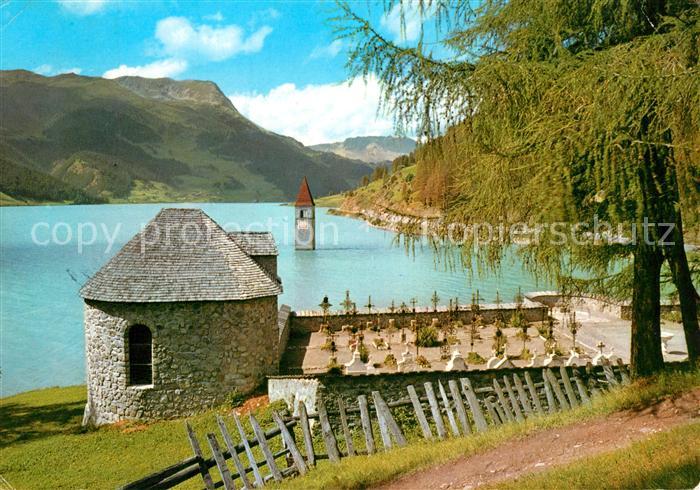 Graun Vinschgau Kirchturm im See Friedhof