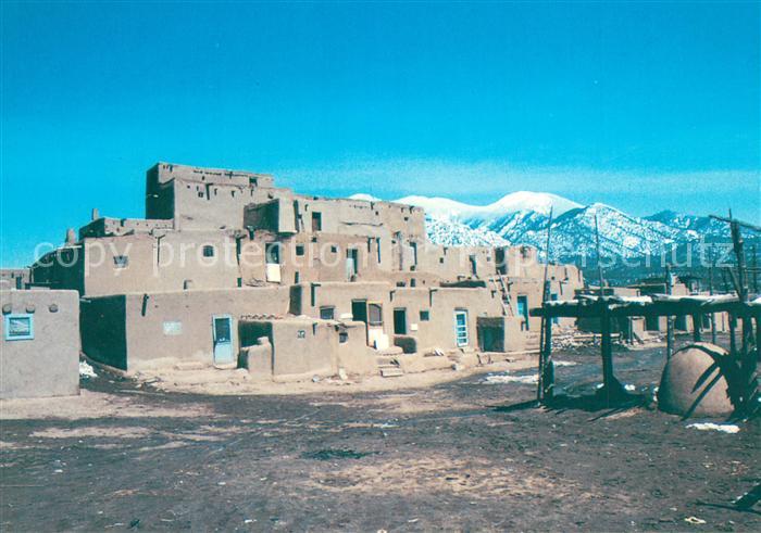 Taos Snow capped mountains behind Taos Pueblos