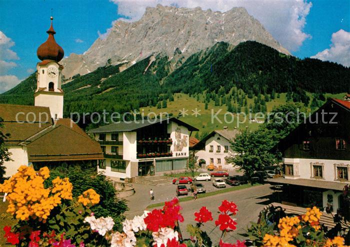 Ehrwald Tirol Hotel Sonnenspitze Blumen Blick zur Kirche Zugspitze Wettersteinge