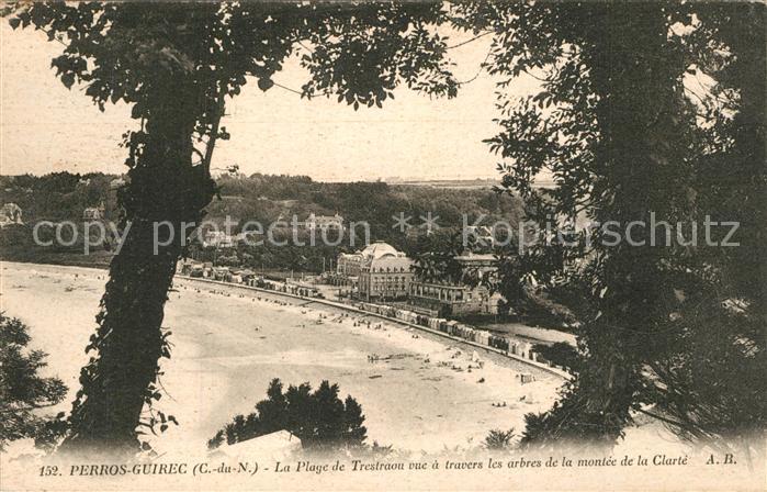 Perros-Guirec La Plage de Trestraou vue a travers les arbres de la montee de la