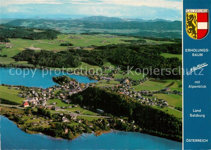 Mattsee Salzburg Fliegeraufnahme mit Hoellengebirge und Traunstein