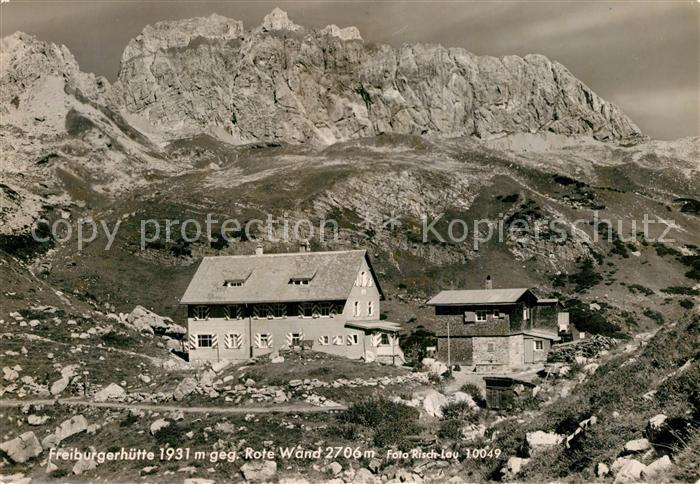 Lech Vorarlberg Freiburgerhuette mit Rote Wand