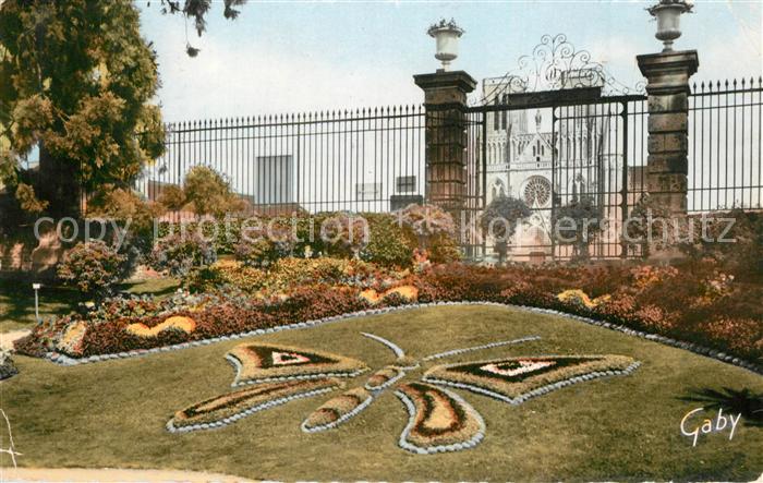 Avranches Jardin des Plantes Le Papillon au fond la Cathedrale