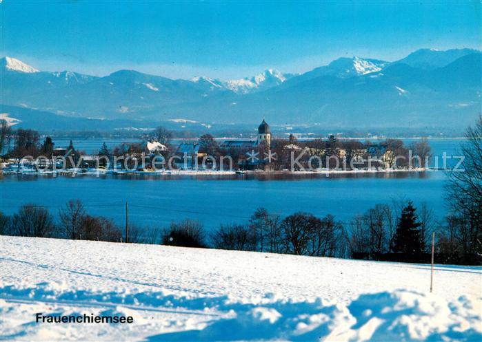 Frauenchiemsee Kloster Frauenwoerth Klosterkirche Chiemsee Alpenpanorama im Wint
